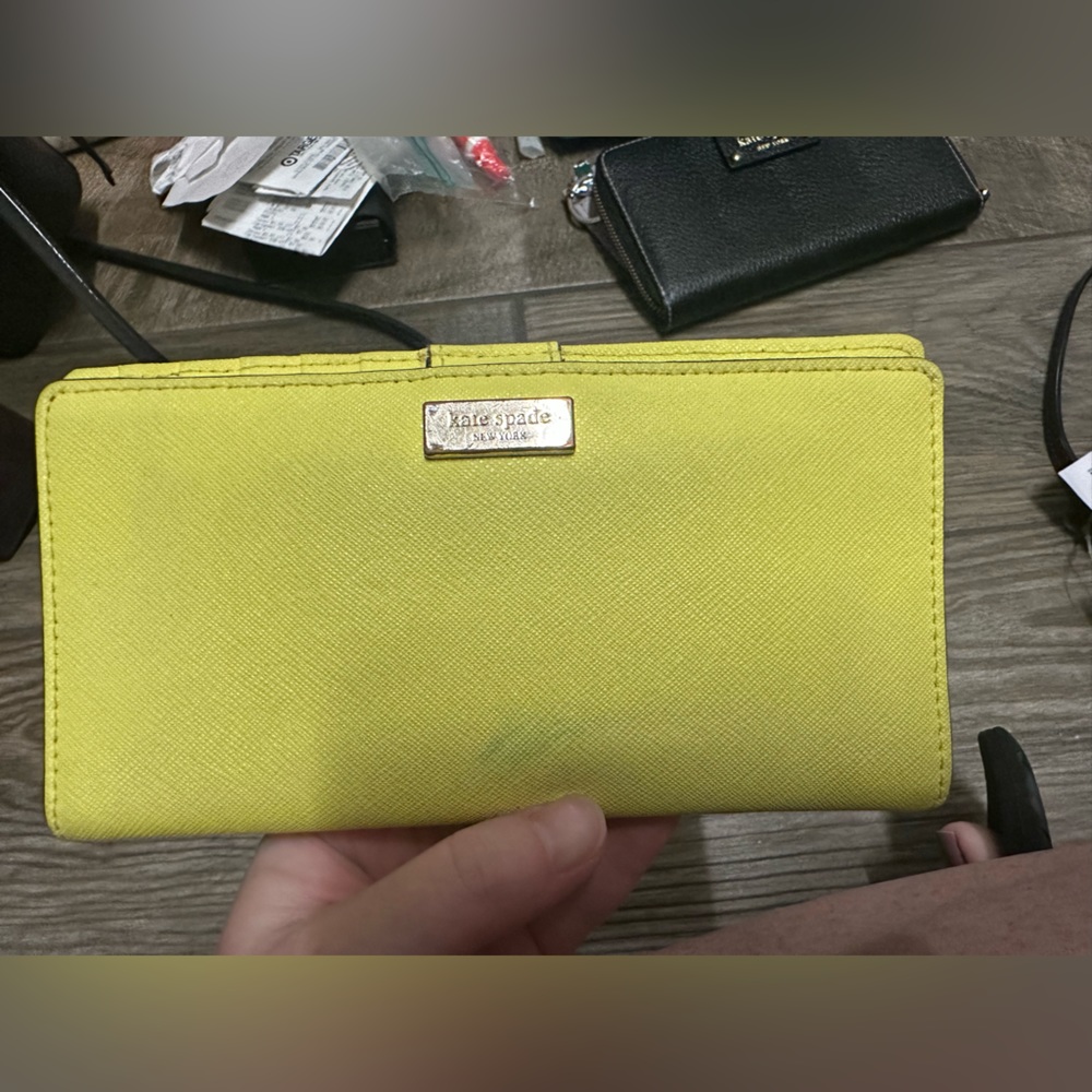 Kate spade wallet has a lot of wear